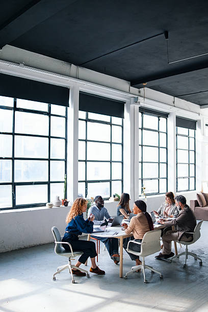 istock Team Collaboration in a Modern Office Space with Natural Lighting 2226298659