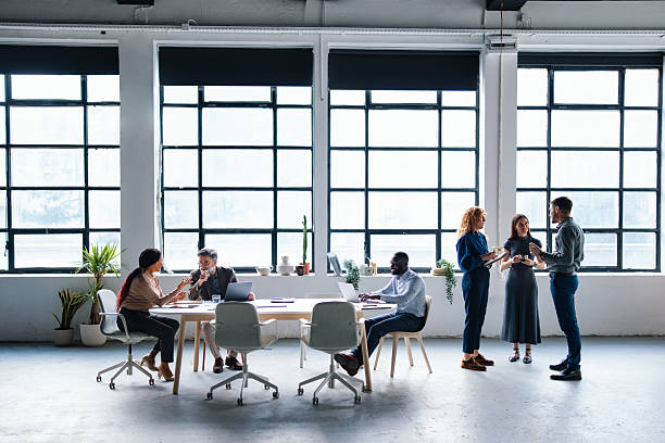 istock Modern Office Coworking Space with Diverse Professionals Collaborating and Interacting 2226298681