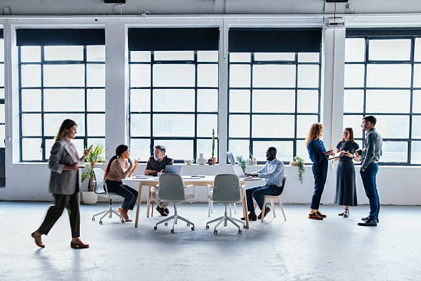 istock Modern Coworking Space with Diverse Team Collaborating in Bright Office 2226298690