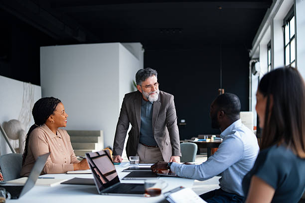 istock Diverse Team Engaged in a Collaborative Business Meeting in a Modern Office 2226298697
