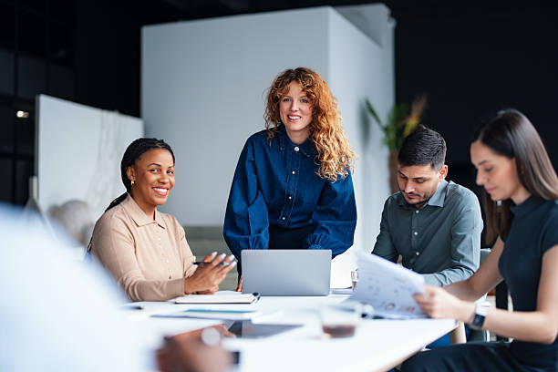 istock Diverse Team Collaborating During a Productive Office Meeting in Modern Workspace 2226298704