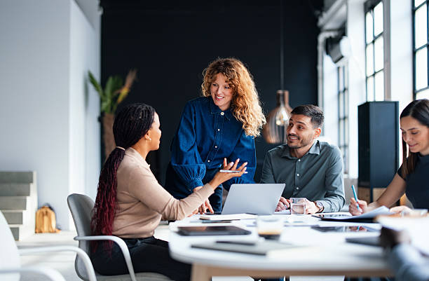 istock Team Engaging in a Collaborative Business Meeting at a Modern Office 2226298718