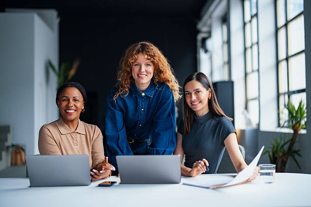 istock Team of Diverse Professionals Collaborating at a Modern Office Workspace 2226298833