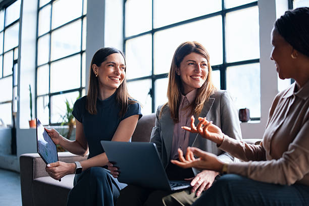 istock Professional Team Discussing Ideas in a Modern Office Environment 2226298877