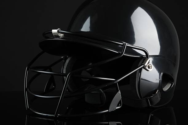 istock One baseball helmet on black background, closeup 2226305481