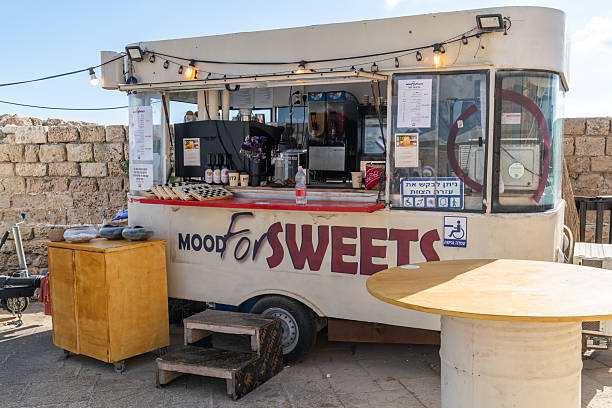 Caesarea, Israel April 15, 2025 Food truck at Caesarea National Park in Israel. Mood for Sweets van selling ice cream, crepes and other sweet foods.