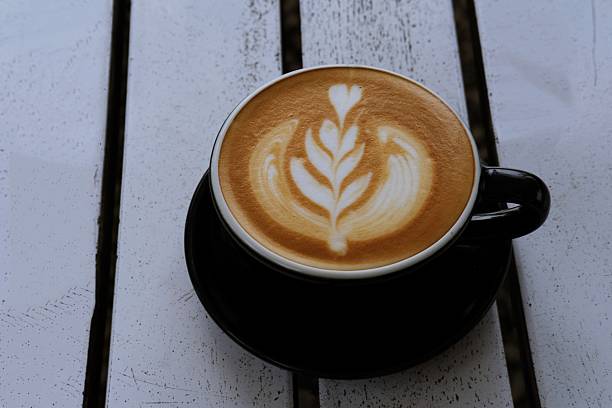 Latte Art Captured Top View on Wooden Table