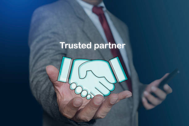 Close-Up Of Businessmen Shaking Hands