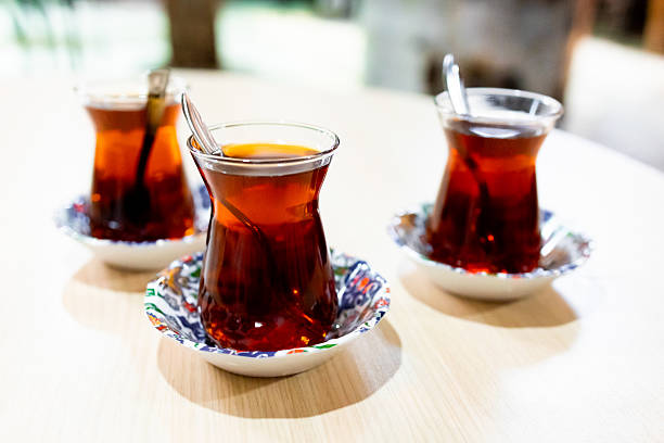 istock Turkish tea in traditional glasses on wooden table 2226318248