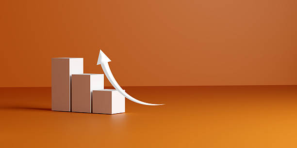 istock Growth visualized by a white upward curving arrow emerging from rising bar columns on a warm orange background, symbolizing business success, financial progress, upward trends, and positive trends. 2226321613