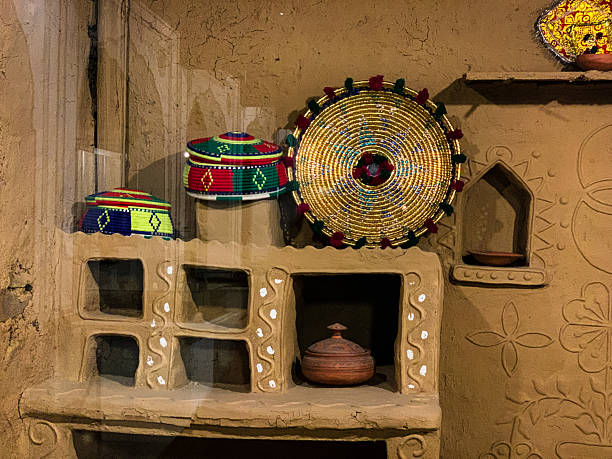 istock Traditional Sindhi kitchen utensils are displayed inside the mud window, reflecting the rich heritage of Sindh. 2226326918