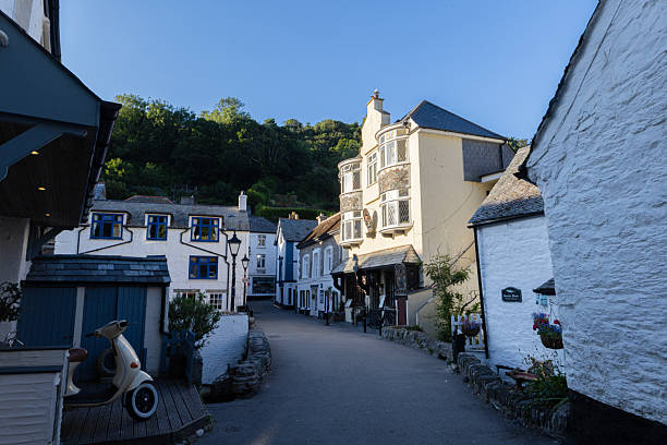 Polperro Cornwall UK 11th July 2025 Pretty white stone houses in the popular tourist resort of Polperro in Cornwall
