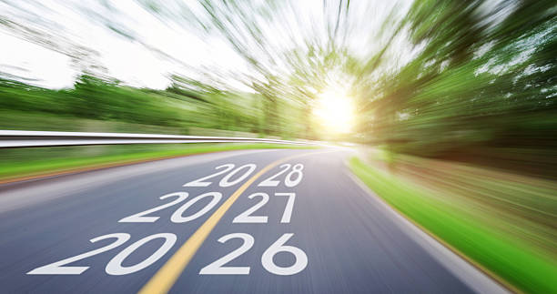 istock Blurred road with new year number 2026, 2027, 2028 2226337169