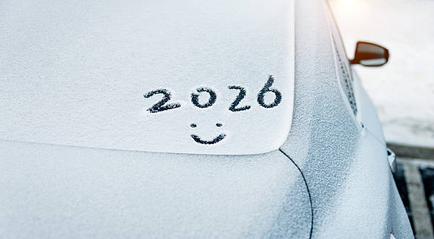 istock New year 2026 and smiling face written on car windshield 2226337183