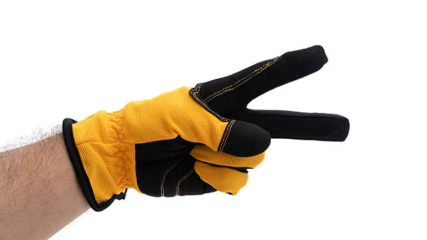 istock Yellow glove making a peace sign gesture 2226338775