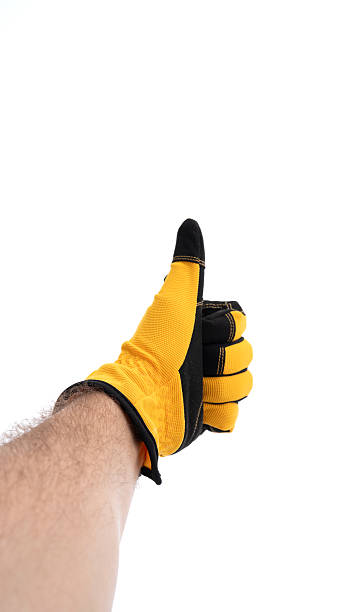 istock Yellow-gloved hand giving thumbs up 2226338807
