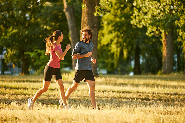 istock Young adults enjoying a morning jog together 2226345287