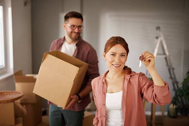 istock Happy couple is moving into new apartment 2226345512