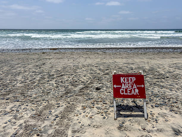 Keep area clear warning sign at the beach in La Jolla, California.