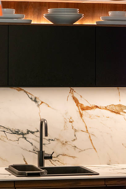 istock Sleek countertop water-cooler dispenser in luxury marble kitchen interior 2226355008