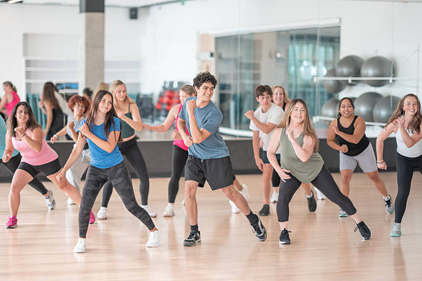 istock Group of Individuals Enjoying a Fitness Dance Class in a Studio Setting 2226355399