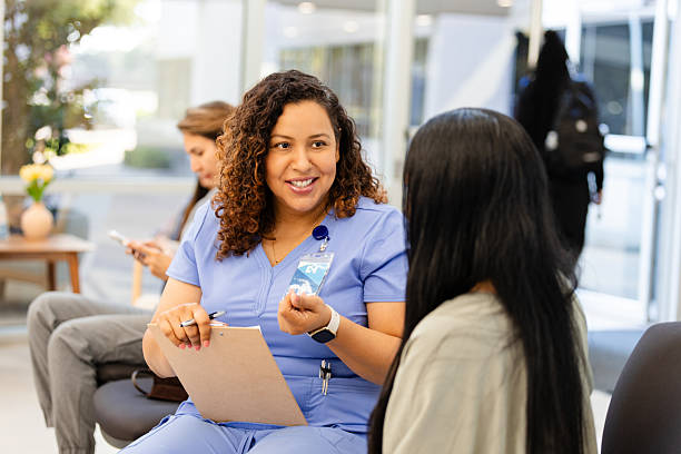 istock Healthcare Worker Talking with Patient in Doctor's Office 2226357515