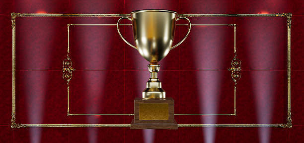 istock Golden trophy Isolated on red Background, with golden frame 2226360652