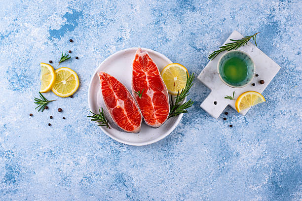 istock Raw uncooked salmon with rosemary 2226364150
