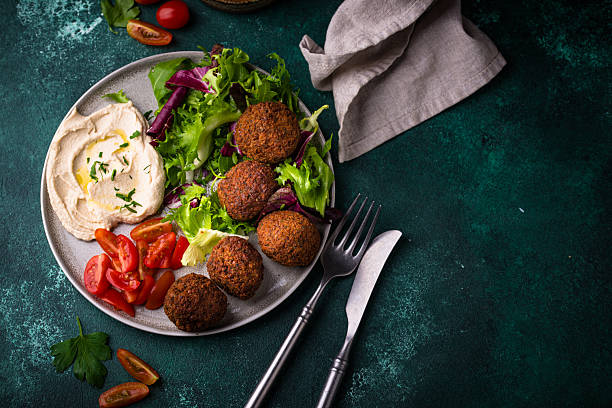 istock Salad with hummus, falafel and vegetables 2226366000