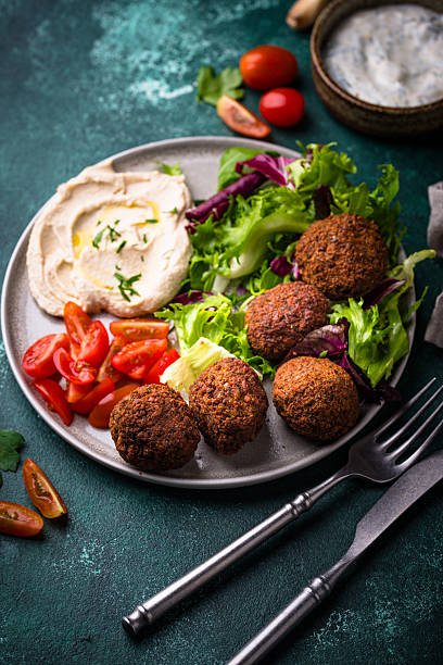istock Salad with hummus, falafel and vegetables 2226366246