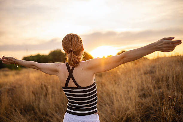 istock Woman enjoy sunset with gratitude 2226368760