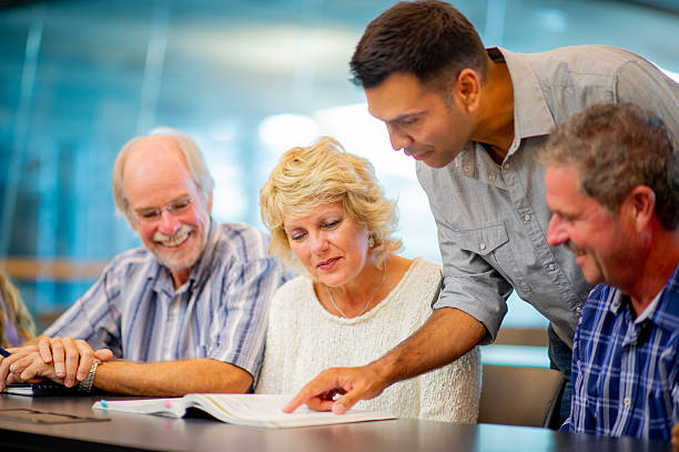 istock Group of Adults Collaborating During an Educational Workshop in Modern Setting 2226370924
