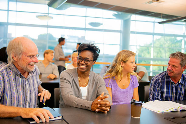 istock Group of Diverse Adults Collaborating and Learning Together in a Classroom Setting 2226370991