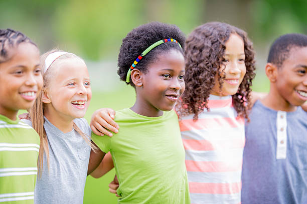 istock Friends Bonding Together Outdoors in a Green and Cheerful Environment 2226373021