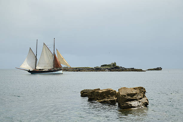 Antique Sail Boat Along the Coast