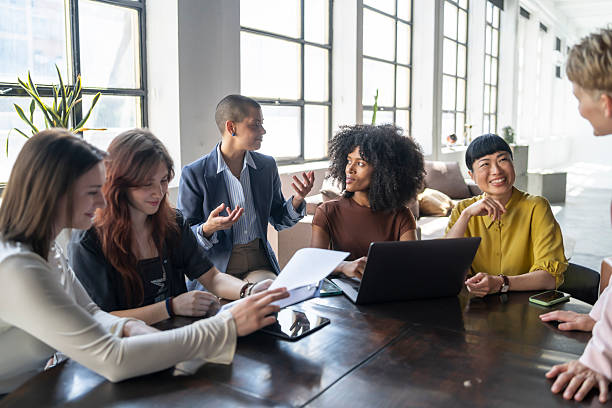 istock Businesswomen collaborating on project in modern office 2226383809