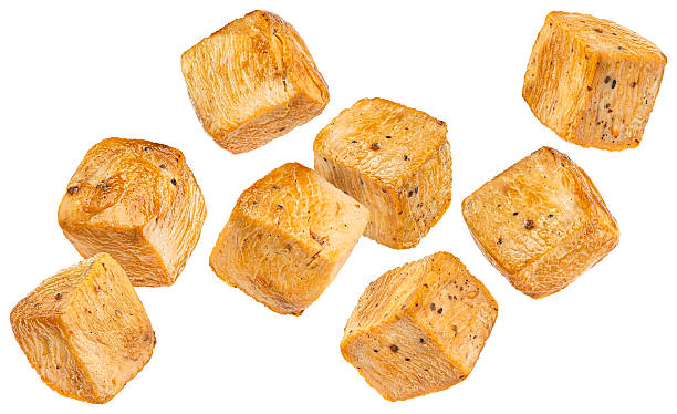 istock Roasted chicken cubes isolated on white background 2226383927