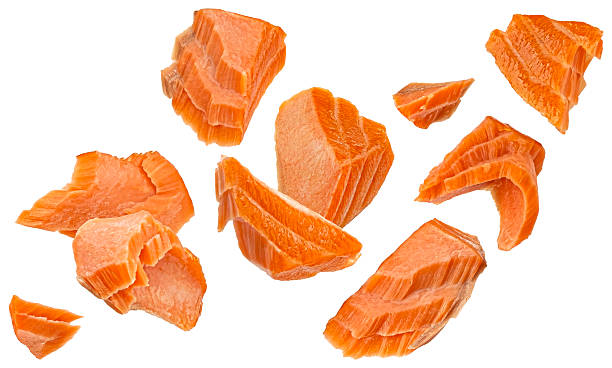 istock Smoked salmon pieces isolated on white background 2226383941