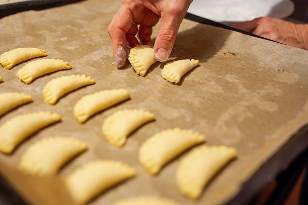 istock Freshly Baked Golden Crescent Cookies on Tray 2226388883