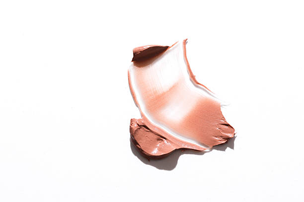 istock Shape and texture, Strokes of beige foundation on white background 2226400324