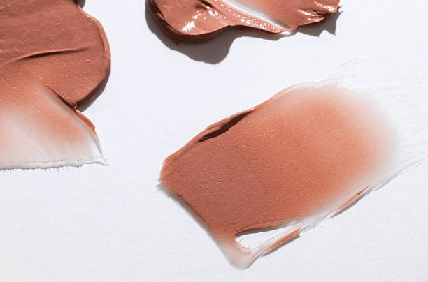 istock Shape and texture, Strokes of beige foundation on white background 2226400329