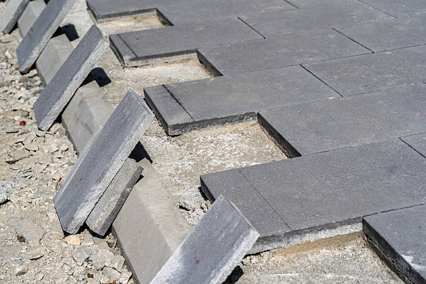 istock Pedestrian Walkway Upgrade in Progress with Concrete Paving Blocks 2226403897