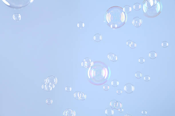 istock Beautiful transparent soap bubbles on light grey background 2226405228