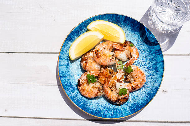 istock Grilled tiger shrimps with spice and lime 2226406348