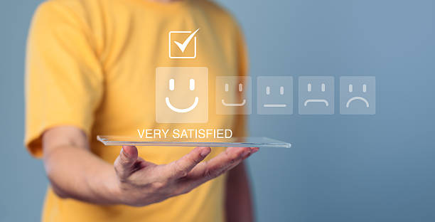 istock Happy Customer Giving Positive Online Feedback Survey on Tablet 2226407098