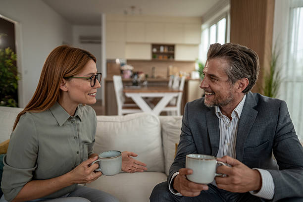 istock Business partners having a casual meeting, drinking coffee and smiling 2226409105