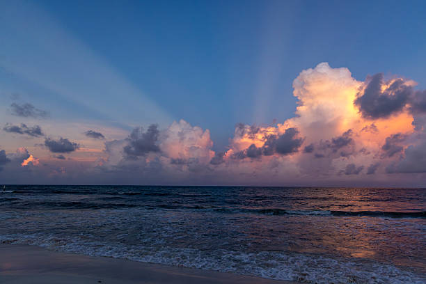 istock A Stunning Sunset Over a Serene Ocean Horizon with Beautiful Cloud Reflections in the Sky 2226409740