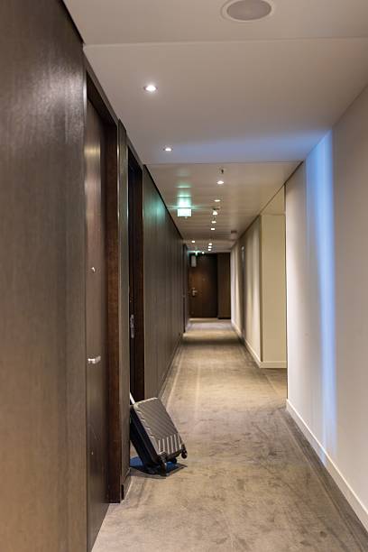 istock A modern hotel corridor with soft lighting and luggage, creating a welcoming atmosphere 2226409941