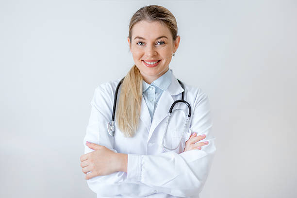 istock Smiling professional doctor with a stethoscope posing with arms crossed 2226412431