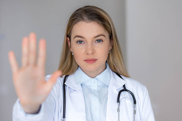 istock Medical professional gesturing with hand in a preventative and serious manner 2226412442